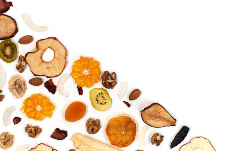 Dried fruit mixture on white background